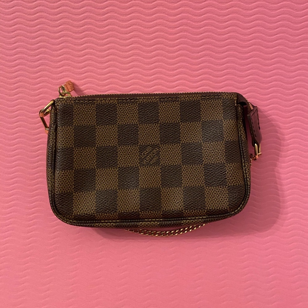 Lv pochette accessoires in Damier Ebene like new